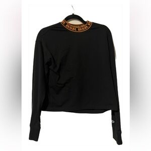 black and orange long sleeve top